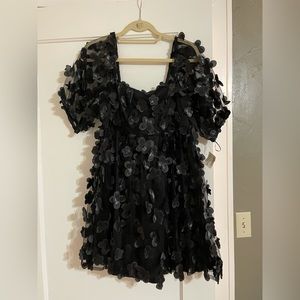NWT Impeccable Pig black tulle puff sleeve dress with flower appliqués.